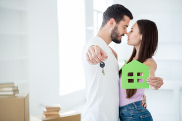 Profile side view portrait of his he her she nice attractive lovable dreamy gentle wife husband family hugging holding in hands key house rent insurance bank purchase space flat light white interior