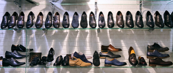 shoes on the shelf in the store, men's shoes are new