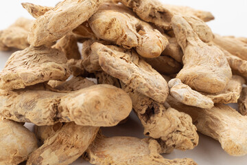 Ginger grains on white ground