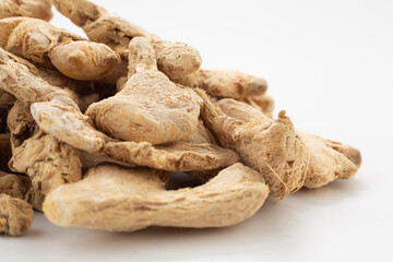Ginger grains on white ground