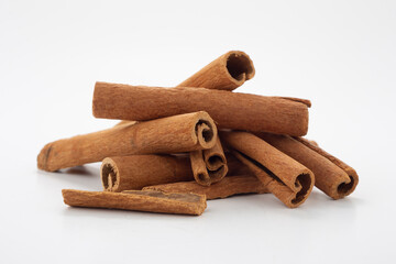 Cinnamon sticks on white background