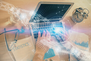 Businessman with computer background with technology theme hologram. Concept of big data. Double exposure.