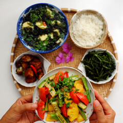 Vietnamese vegan cuisine, daily meal, seaweed, tofu soup, fried vegetables, dried bread cook with sauce, boiled water spinach