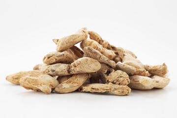 Ginger grains on white ground