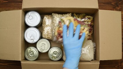 Food donations. Food with long shelf life packed in a box
