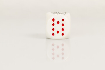 Ten Playing Casino poker dice closeup Isolated on white background with reflection. Abstract Pattern