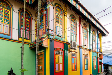 Fototapeta premium Former House of Tan Teng Niah in Singapore, colorful chinese villa in Little India District, with richly carved walls and vivid colors amazing facade.