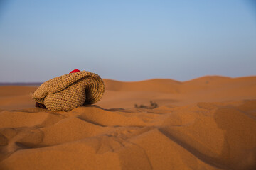 Hat left in the sand of Merzouga Desert
