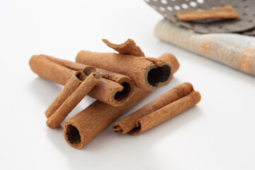 Cinnamon sticks on white background