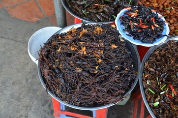 Fototapeta premium Plate with tasty and well seasoned deep fried spiders.