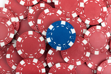 Battle Blue versus Red yin vs yang Playing Poker Chips laying on the table mixed together. Abstract Pattern Background 