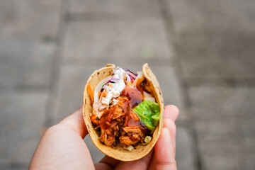 Mexican traditional authentic homemade tacos with pulled pork beef chili con carne serve with...