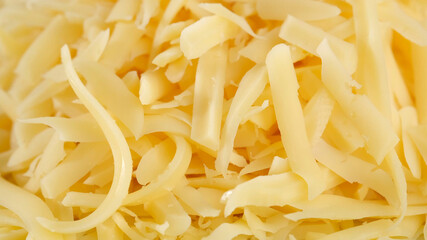 grated cheese top view, close up