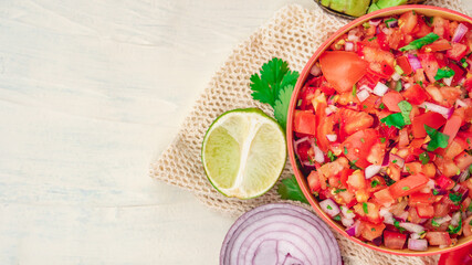 Tomato Salad mixed with red onion Mexican food homemade authentic style made from fresh healthy organic ingredient for vegan appetizer