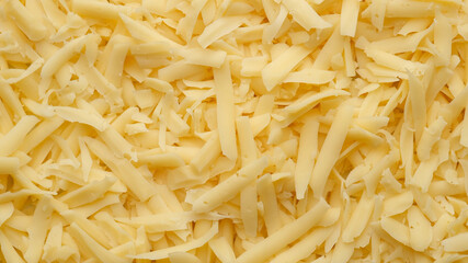 grated cheese top view, close up