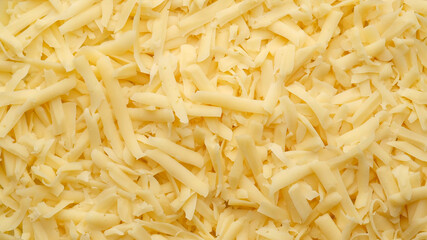 grated cheese top view, close up