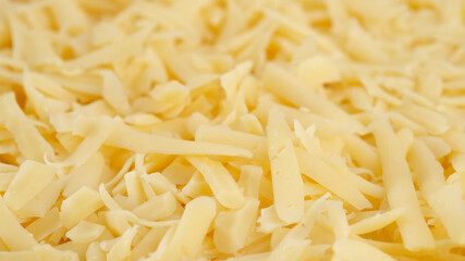 grated cheese top view, close up