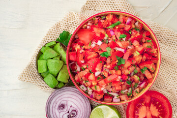 Tomato Salad mixed with red onion Mexican food homemade authentic style made from fresh healthy organic ingredient for vegan appetizer