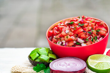 Tomato Salad mixed with red onion Mexican food homemade authentic style made from fresh healthy organic ingredient for vegan appetizer