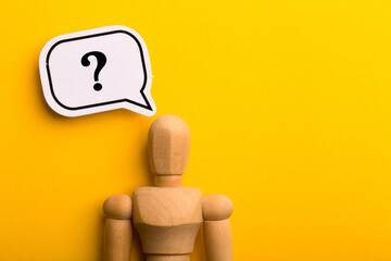 Wooden Man With Question Mark Speech Bubble