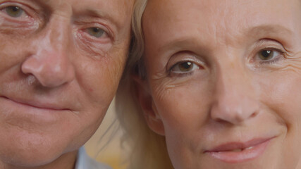 Close up of happy mature couple in love enjoying tender moment