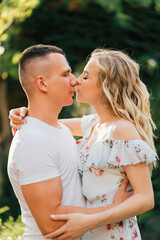 Fototapeta premium beautiful and happy couple having fun in garden.
