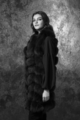 Stylish woman in fur coat