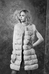 Stylish woman in fur coat