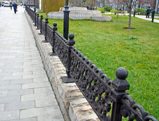 beautiful black forged metal fence, Moscow, Russia