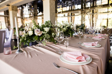 Presidium table setting with empty wine glasses