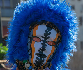 carnival mask with blue feathers, close up