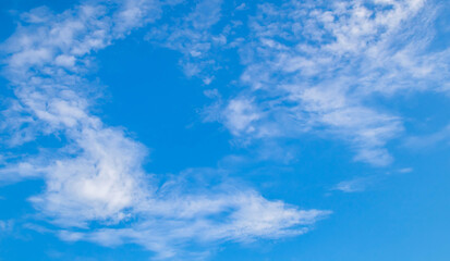 Blue sky background with clouds.