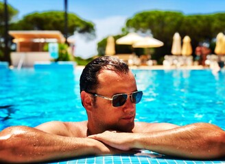 man in swimming pool