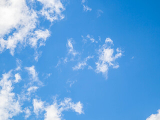 blue sky with cloud closeup. blue sky background with a tiny clouds.
