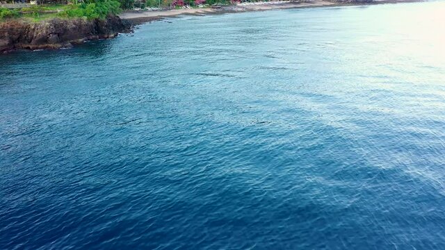 Water surface of ocean, Amed bay coastline, Aerial view. Indonesia, Bali.