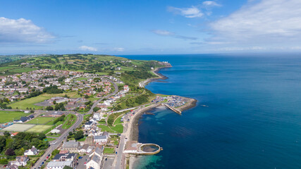 Aerial view on coast in Whitehead, Northern Ireland. Drone photo of town and water of Irish Sea  © Maciej
