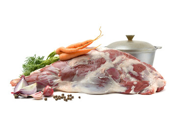 Raw leg of mutton on a bone on a white isolated background. Sheep meat close-up.A fresh piece of...