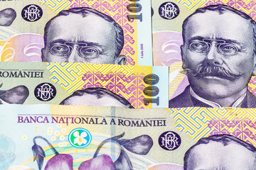 Selective focus on detail of lei banknotes. Close up macro detail of romanian lei banknotes, 100 lei isolated. World money concept, inflation and economy concept