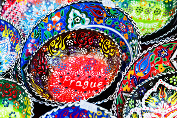 Hand made souvenir pot with colorful ornamental motif decoration