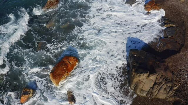 Colorful spring view of Torre Conca beach. Marvelous morning seascape of Mediterranean sea. Captivating outdoor scene of Sicily, Italy. 4k drone flight straight-down video (Ultra High Definition).