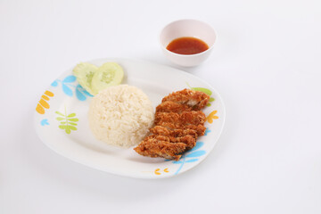 Thai food gourmet fried chicken with rice , khao mun kai in wood background