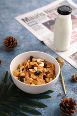 Cereal dessert with corn oat and dry fruits isolated in blue background