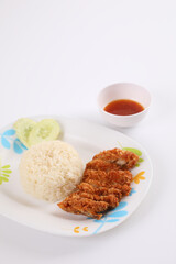 Thai food gourmet fried chicken with rice , khao mun kai in wood background