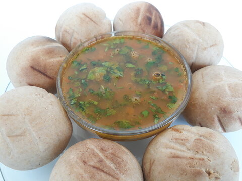 Special Rajasthani Dal Baati Dish With Onions