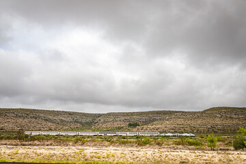 Terrell County, Texas / United States - June 2, 2020: The Amtrak Sunset Limited train travels...