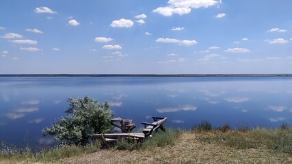 wooden chair on the lake