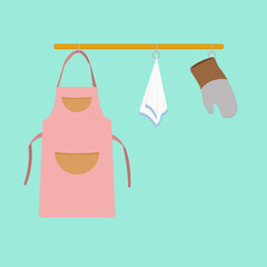 Apron, pot holder and towel for kitchen and cooking on a gold holder