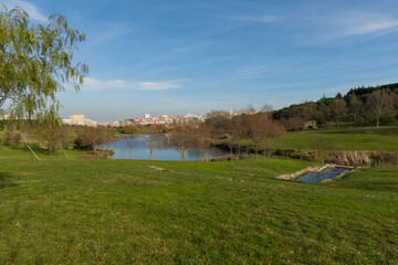 Recreational Park of the city with grass, forest and a crystalline creek in the center of Portugal. Peace Park or Parque da Paz, Almada.