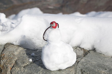 Close up of a mini cute snowman, soft focus