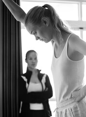 Two upset women with relationship issues pensive after a bad argument at home. Feeling hurt and...